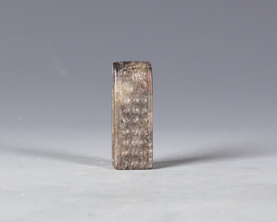 A Rare Jade Knife Handle: A rare Jade Knife Handle, with a white sticker hand-written, China Ming Dynasty(1550-1644) at the back. Length 2.75" Width 0.75"