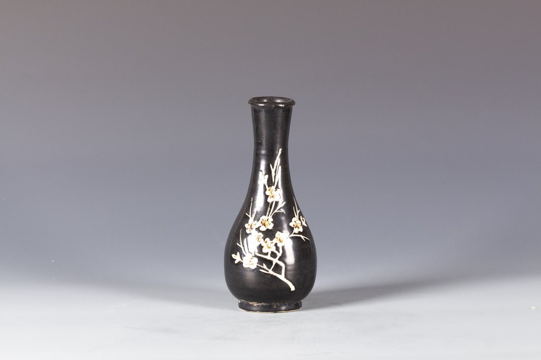 Jizhou Ware Black Glaze Porcelain: Jizhou Ware Black Glaze Pear-shaped Vase, in low relief of bird and plum blossom. Diameter 3.5” Height 8.5”