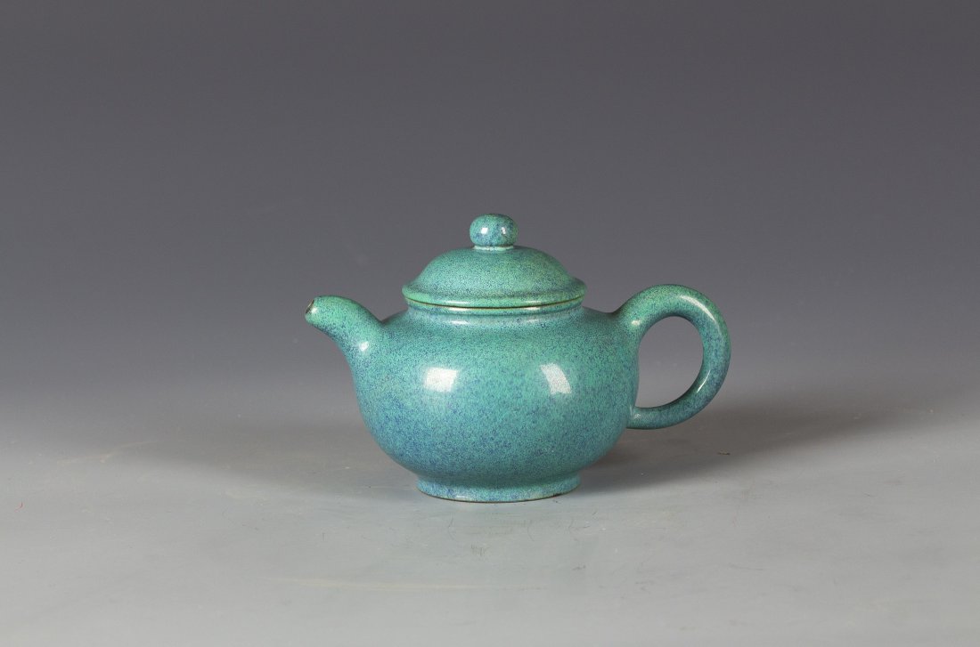 Chinese Yixing Zisha Teapot: Chinese Turquoise Blue Glazed Zisha Clay Teapot. Yixing, China provenance with mark on the bottom. Length 6.25" Height 4"