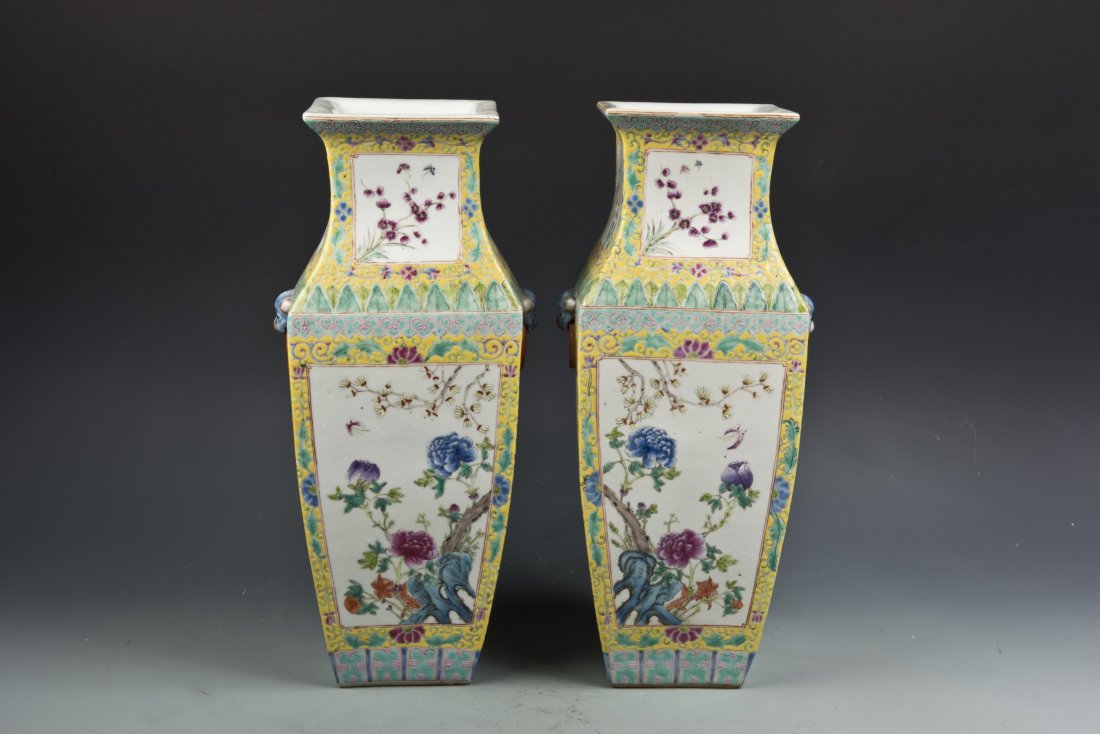 Pair of Famille Rose Porcelain Square Amphoras: Pair of Famille Rose Porcelain Square Amphoras, with symmetric flower patterns against jaune background, bottom red Calligraphy seal on each. Length 6.25'' Width 6.25'' Height 16.5''