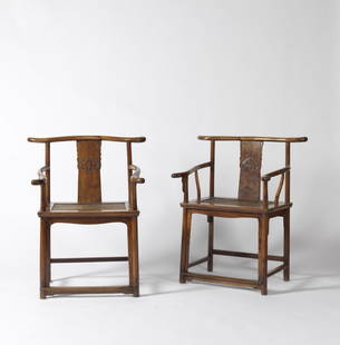 Pair of Chinese Huanghuali or Hardwood Low Yokeback: An Unusual Pair of Chinese Huanghuali or Hardwood Low Yorkback Armchairs, each with an arched crestail joined to a wide S-curved rectangular splat, the stiles similarly curved, on a hard caned seat wi