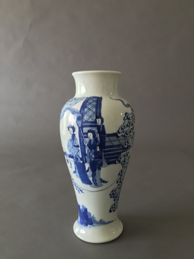 A CHINESE BLUE AND WHITE PORCELAIN VASE: A Chinese blue and white vase with figural painting on the body, short neck connect to slightly flared mouth with proportioned flared foot. Height 10.5"