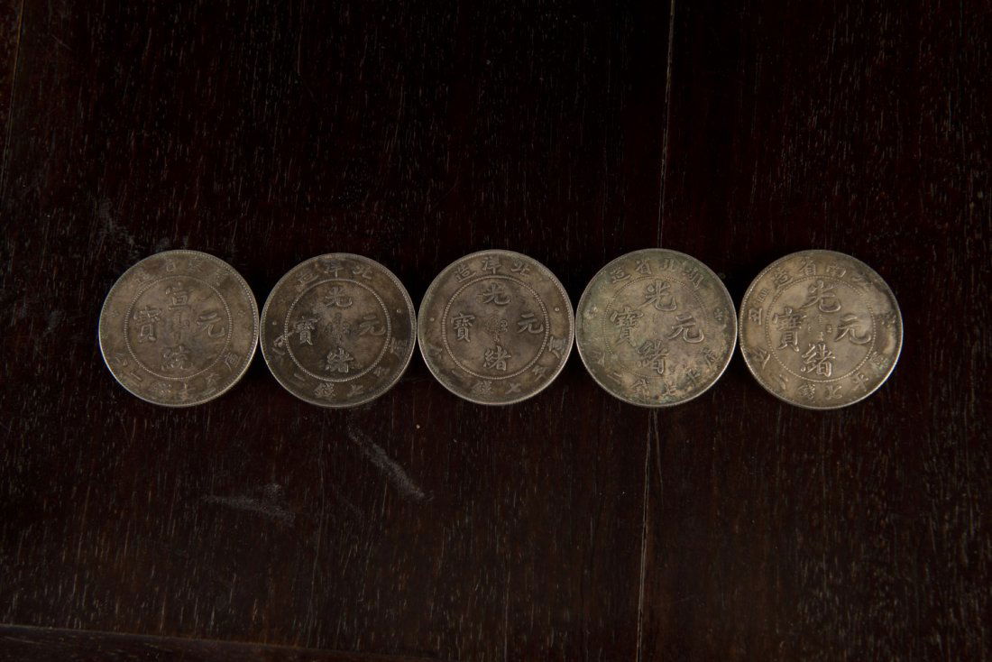 A group of Chinese silver coins (1 of 2)
