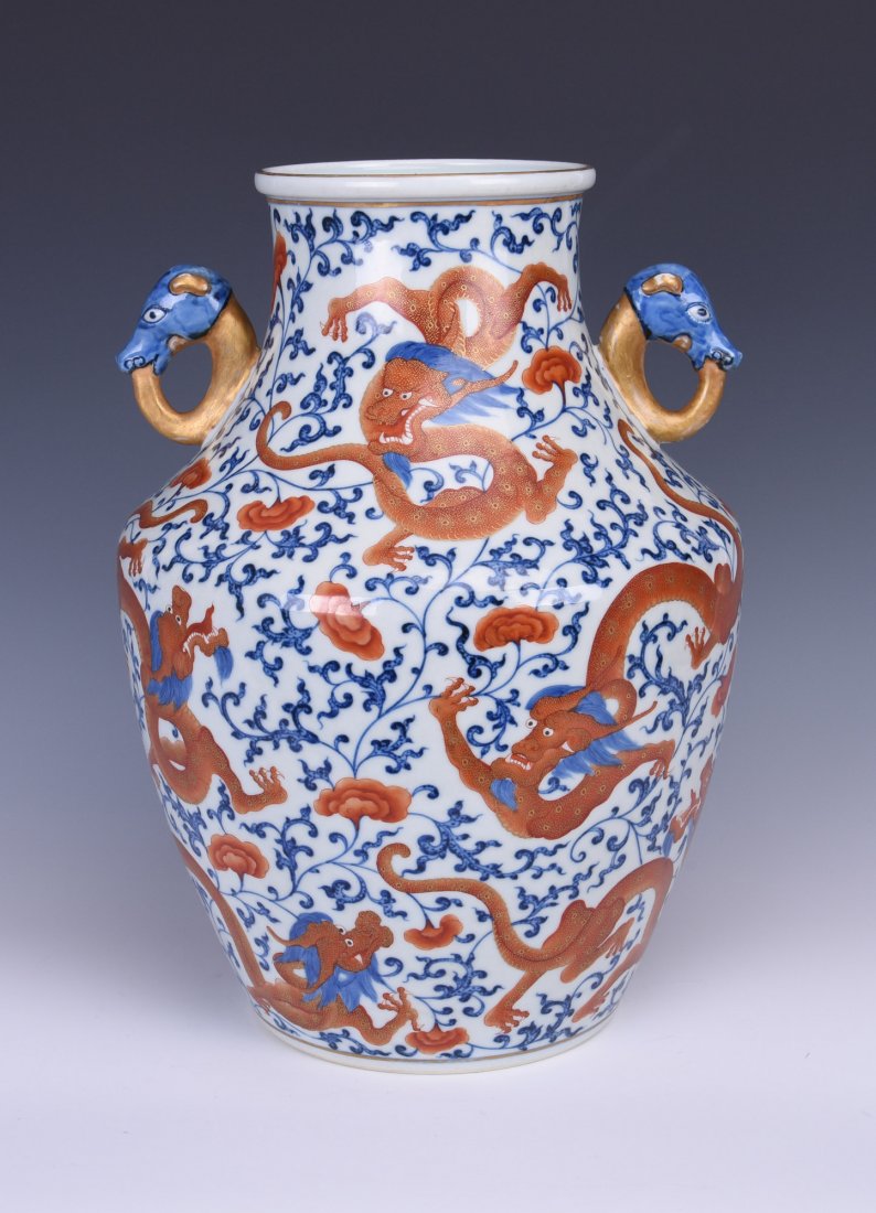 A DOUBLE-HANDLE BLUE AND WHITE PORCELAIN ZUN (1 of 9)