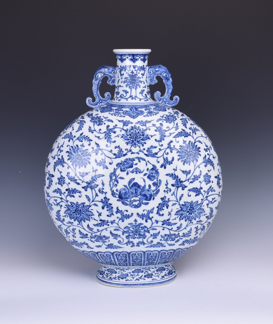 A DOUBLE-HANDLE BLUE AND WHITE PORCELAIN FLASK VASE (1 of 10)