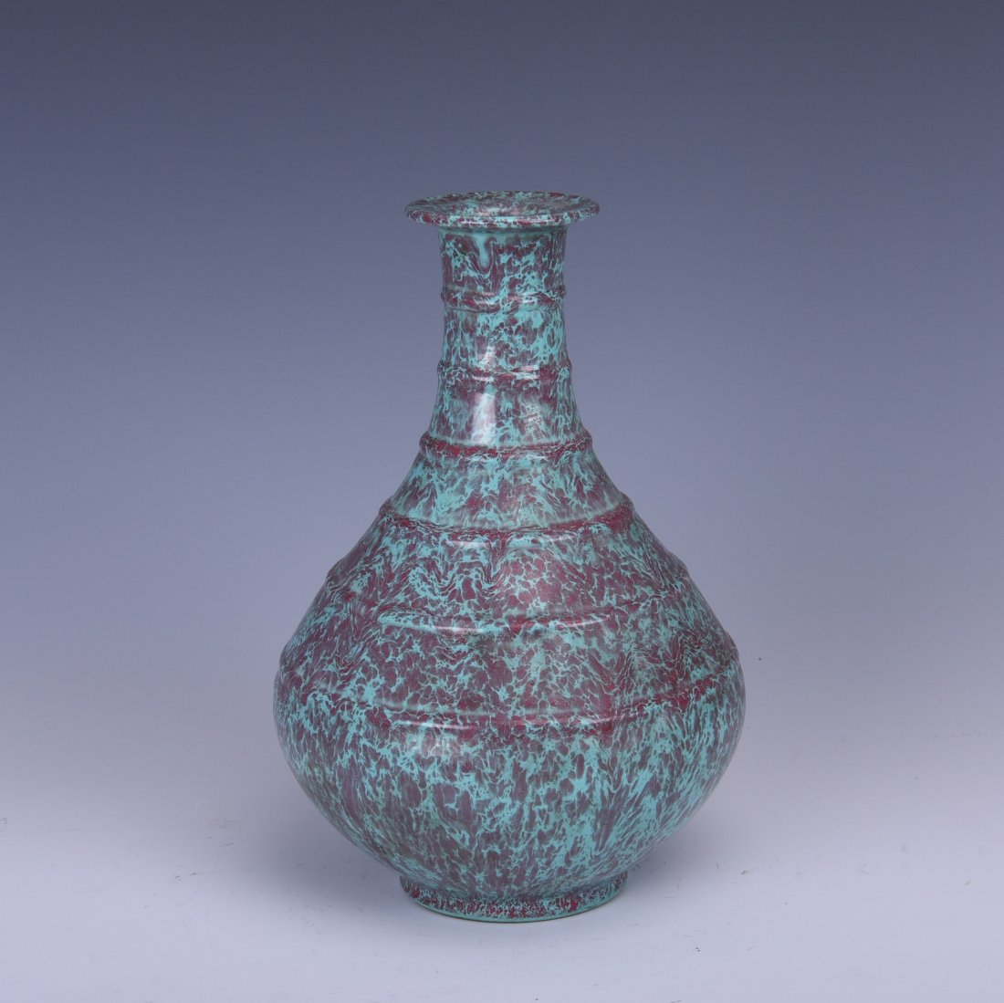 A MOTTLED FLAMBE-GLAZED PORCELAIN VASE (1 of 7)