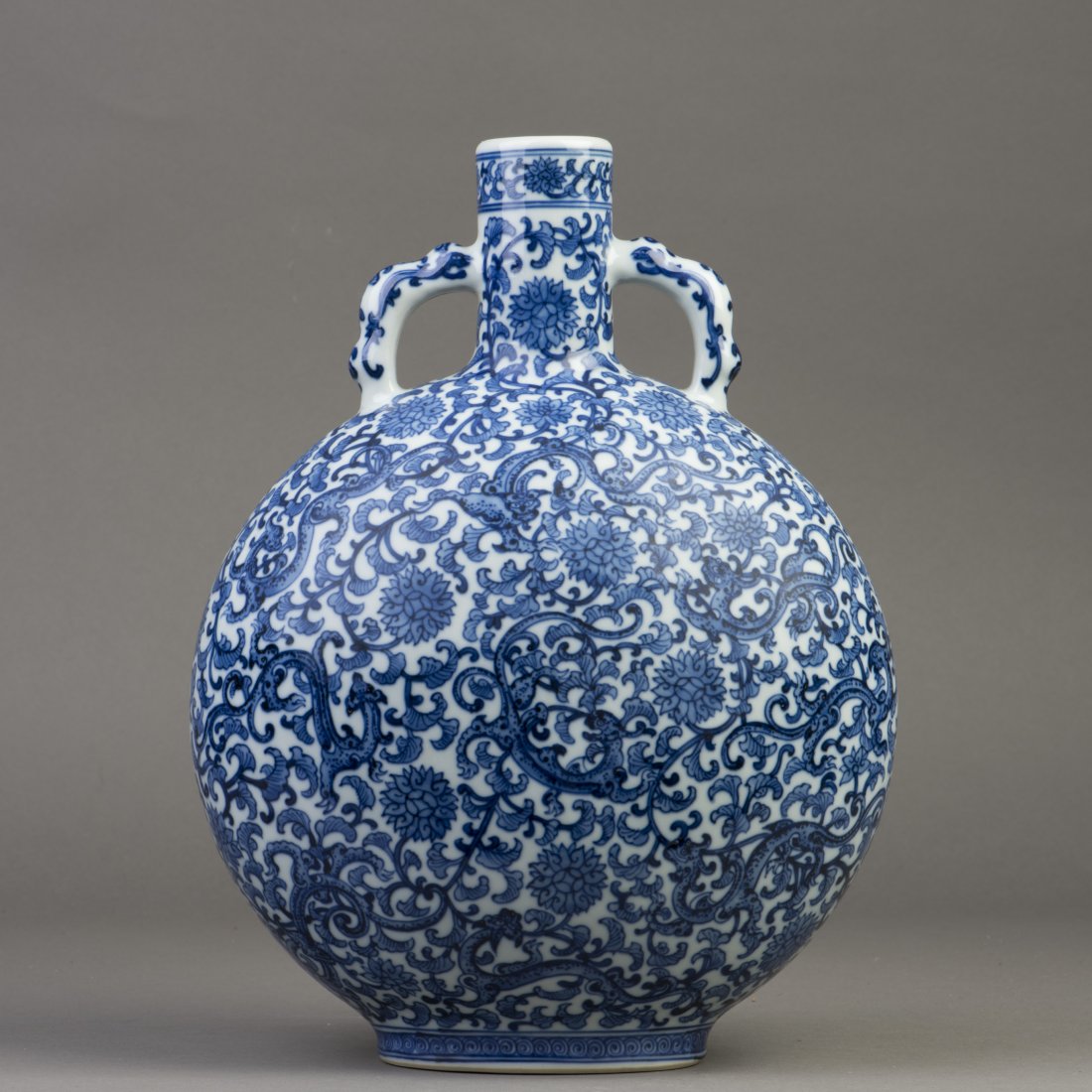 A BLUE AND WHITE MOONFLASK PORCELAIN VASE (1 of 4)