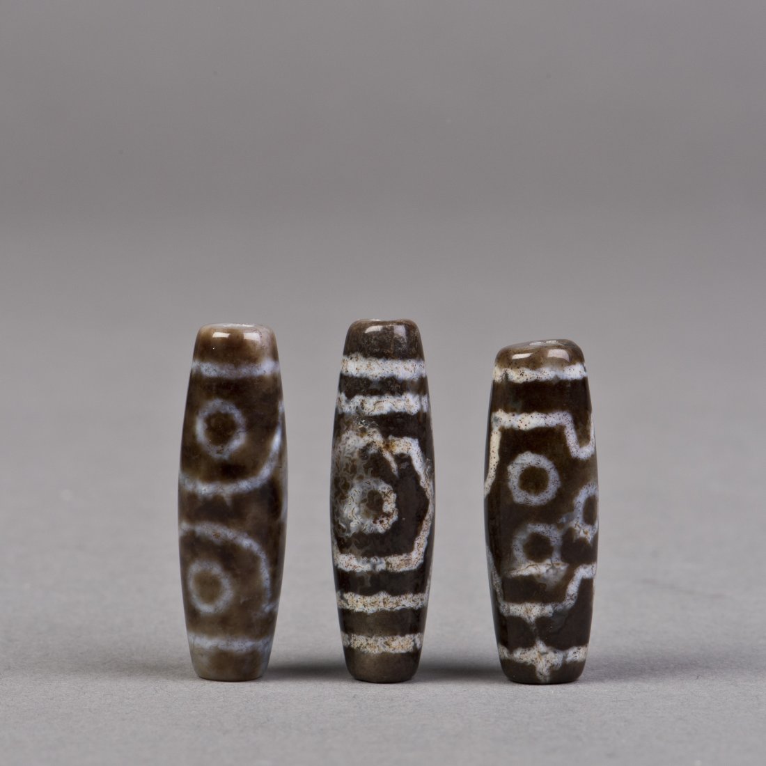 THREE DZI BEADS (1 of 2)