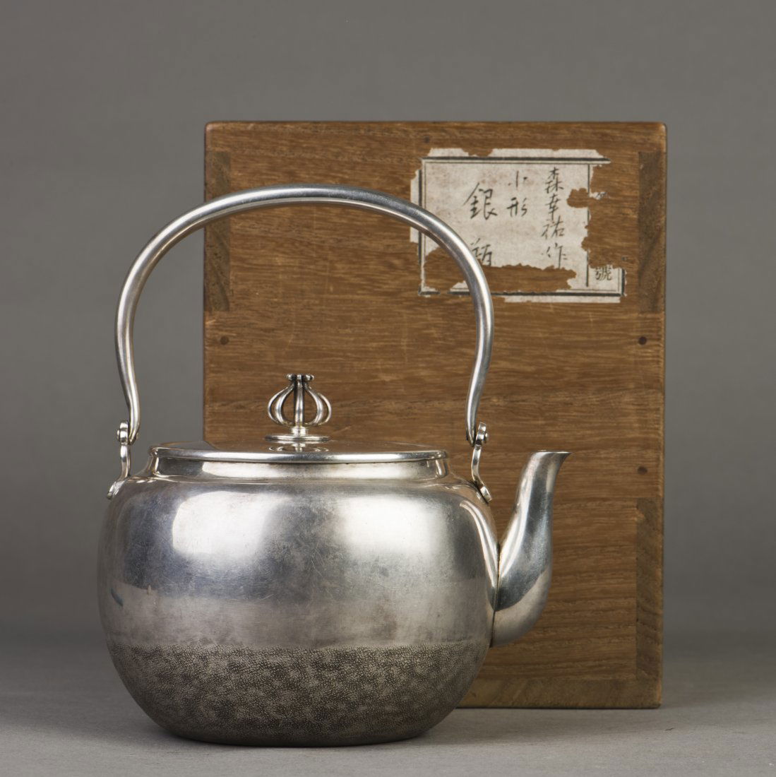 A JAPANESE SILVER TEAPOT (1 of 9)