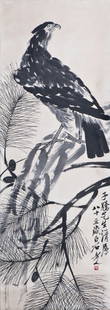 A CHINESE SCROLL PAINTING OF EAGLE: A Chinese verticle scroll painting of eagle perched on branch, ink and color on paper, inscribed and signed with a seal, attributed to Qi Baishi. One side of scroll is chipped at the corner. Height 44