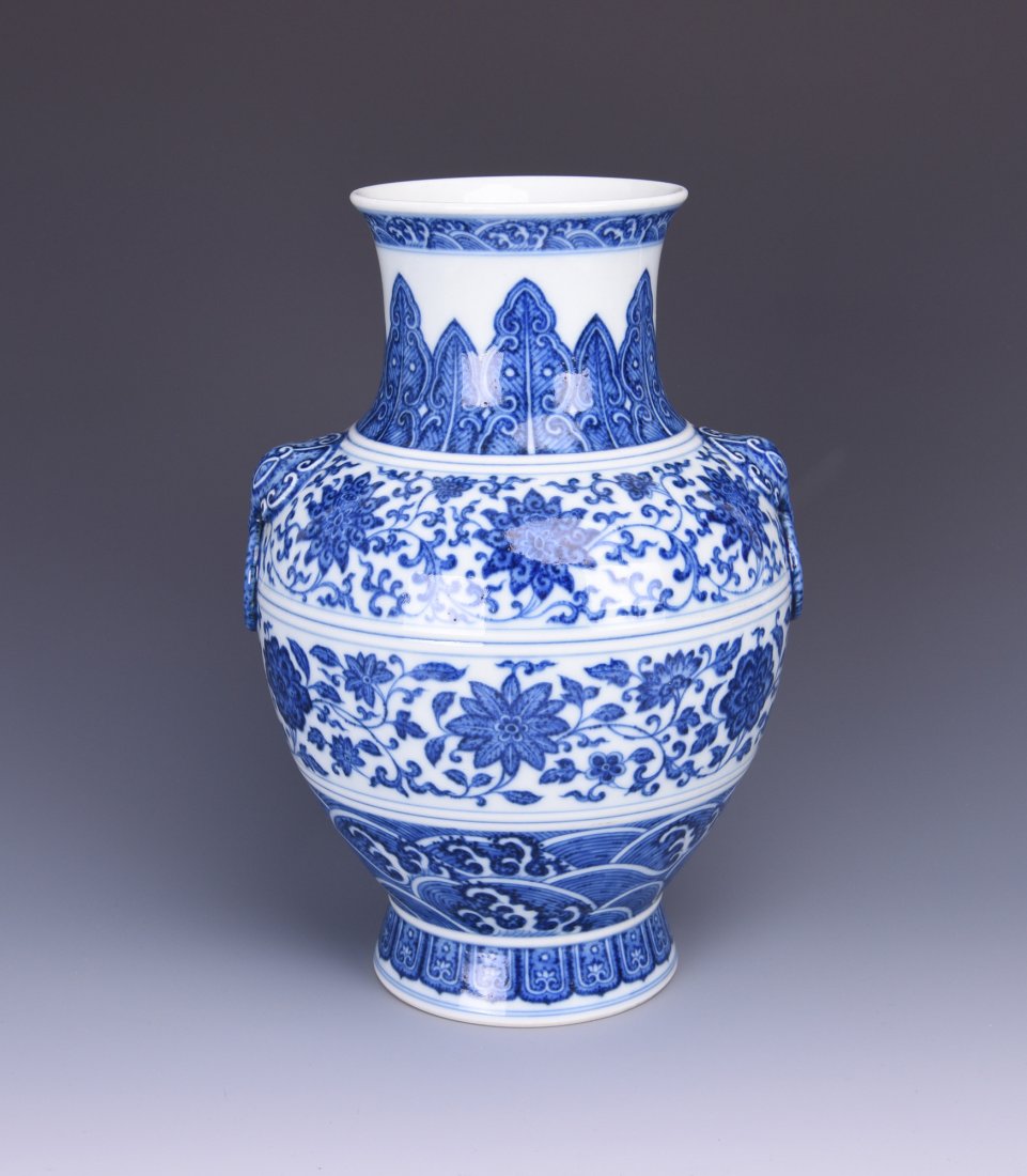 A BLUE AND WHITE PORCELAIN PUSHOU VASE (1 of 8)
