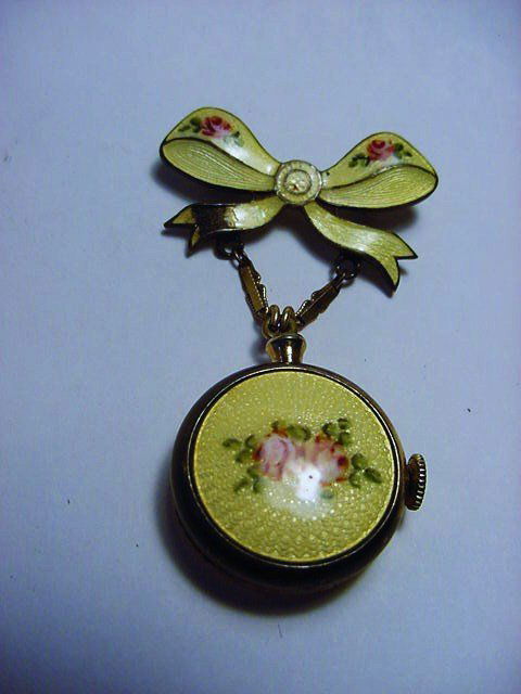 VINTAGE LAPEL WATCH NEEDS WORK CHIP ON BOW: VINTAGE LAPEL WATCH NEEDS WORK CHIP ON BOW