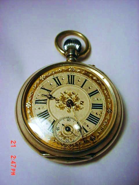 ANTIQUE SWISS SILVER POCKET WATCH WORKS: ANTIQUE SWISS SILVER POCKET WATCH WORKS the watch measures 1.75" inches in diameter. It is in working condition