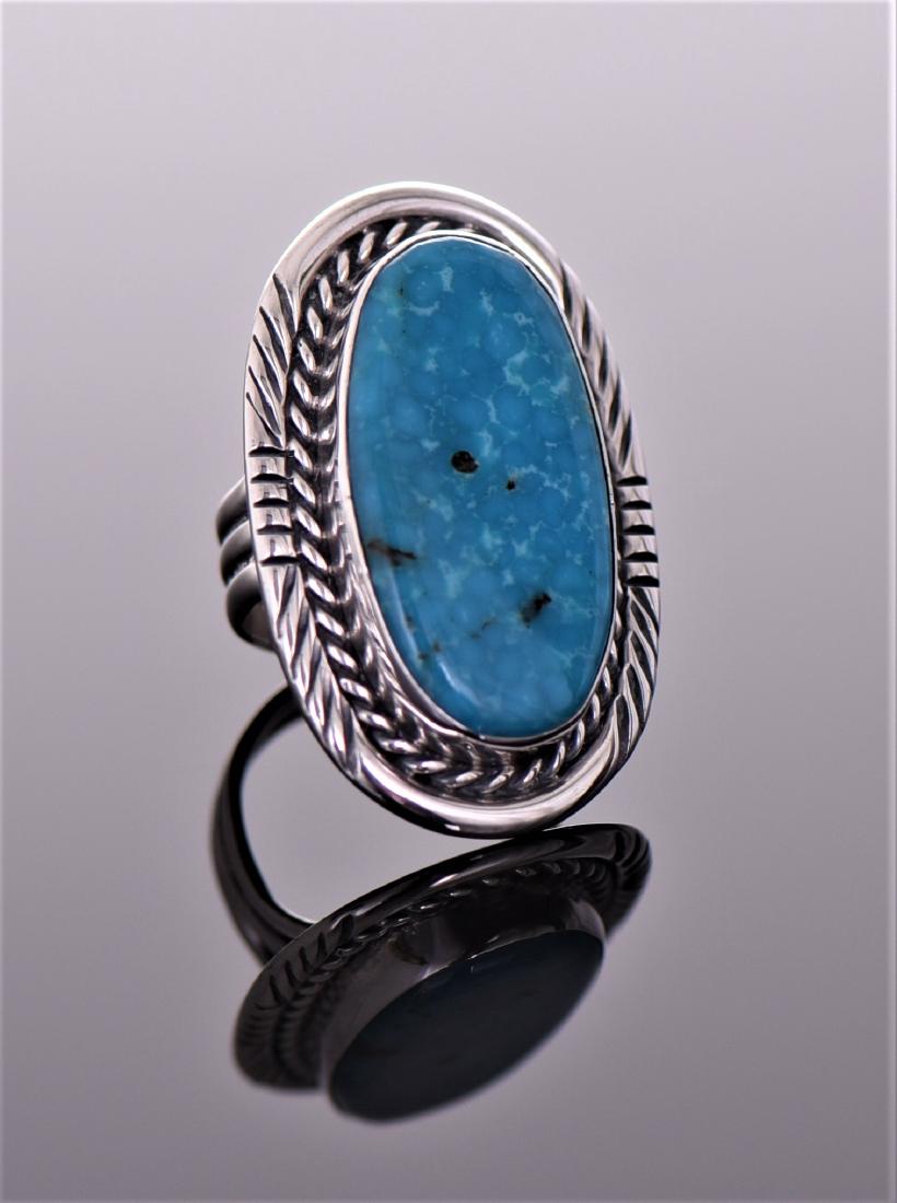 Bill Mex Dineh, Navajo South West Blue Turquo: Bill Mex Dineh, Navajo South West Blue Turquoise Sterling Silver Ring With Silversmith Roping And Stamp work. Silver Tested. Ring Size 7. Estimated less than 50 yrs old. The Navajos are a Native Ameri