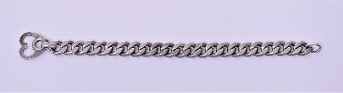Vintage Sterling Silver Cuban Link Bracelet W: Vintage Sterling Silver Cuban Link Bracelet With Heart Shape Clasp Hook. Weight 1.55 ounces. Estimated less than 50 yrs old. 925 Sterling Silver consisting of 92.5% silver and 7.5% copper. Tested Posi