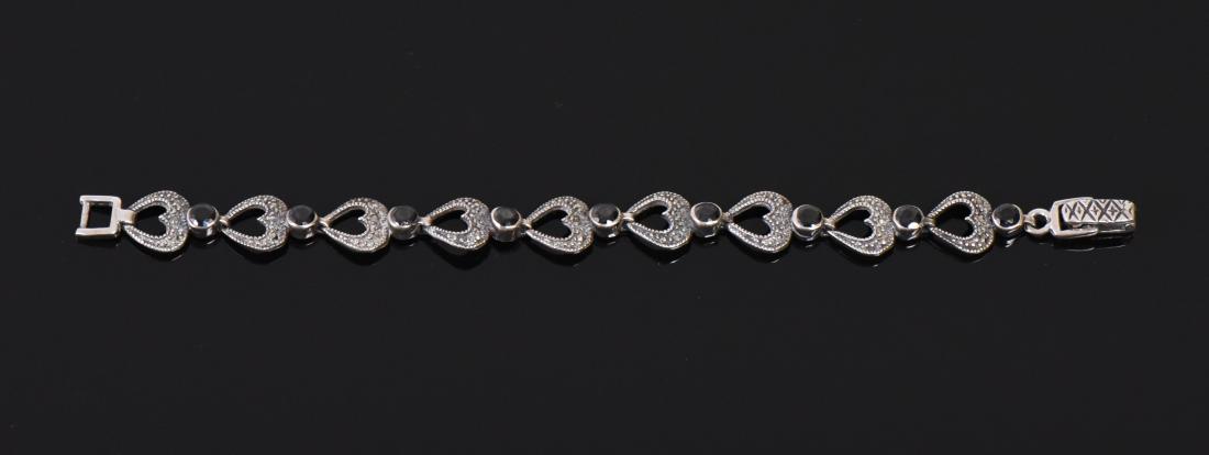 Marcasite 925 Sterling Silver Bracelet. Esti: Marcasite 925 Sterling Silver Bracelet. Estimated more than 50 yrs old. 925 Sterling Silver consisting of 92.5% silver and 7.5% copper. Tested Positive using Nitric Acid Chemical Scratch Test, Cloth R