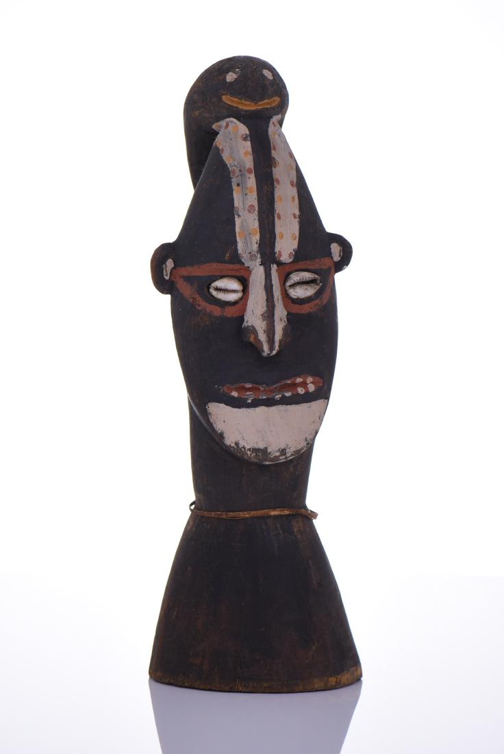 Papua New Guinea Palembai Wood Carving With: Papua New Guinea Palembai Wood Carving With Polychrome Painted Features And Cowry Shell Eyes. Estimated more than 50 yrs old. Oceanic art is the creative works made by the native peoples of the Pacifi