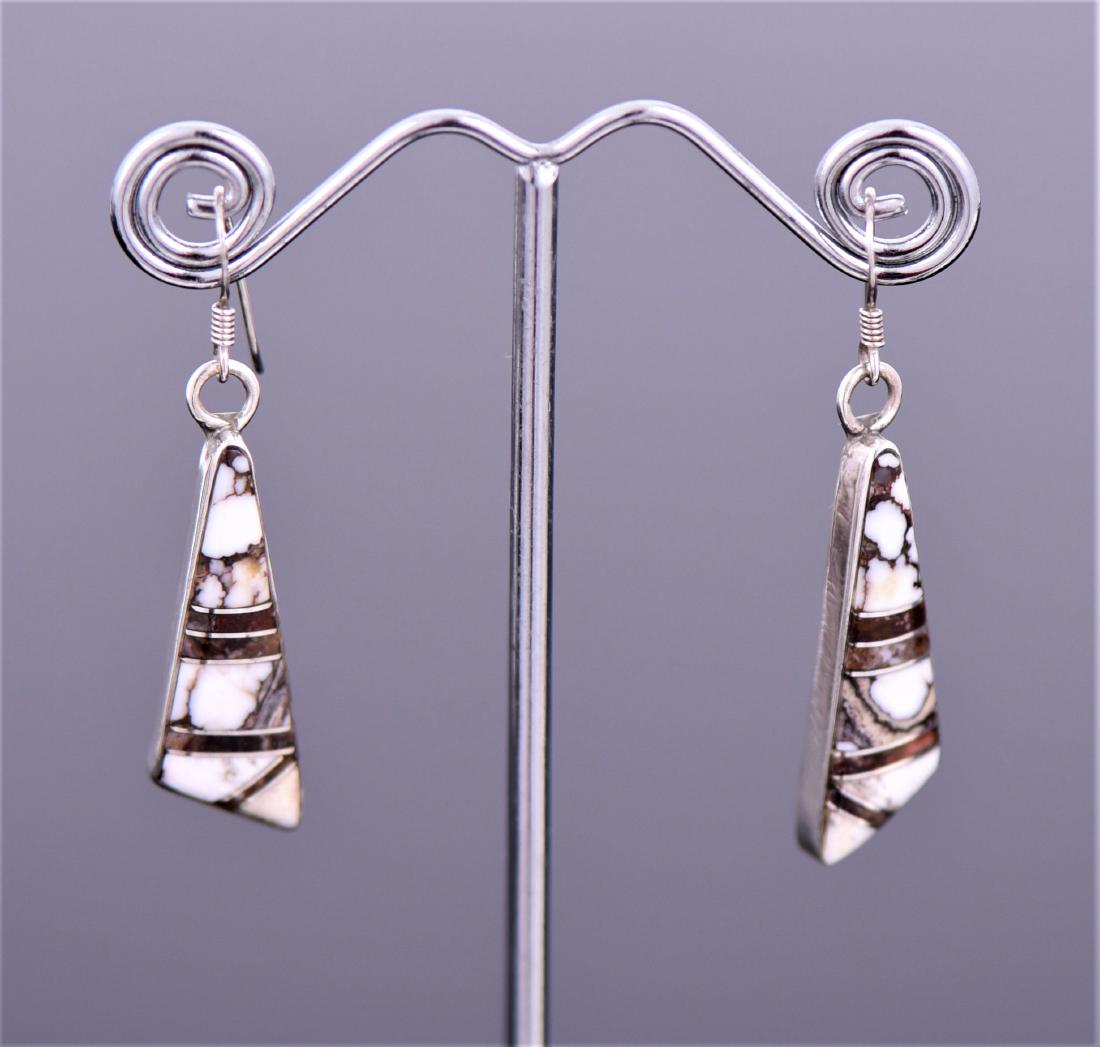 T. Wilson Sterling Silver Zuni Earrings.: T. Wilson Sterling Silver Zuni Earrings. Silver Tested. Estimated less than 50 yrs old. The Zuni Native Americans live in the Pueblo of Zuni on the Zuni River in western New Mexico. Archaeology sugges