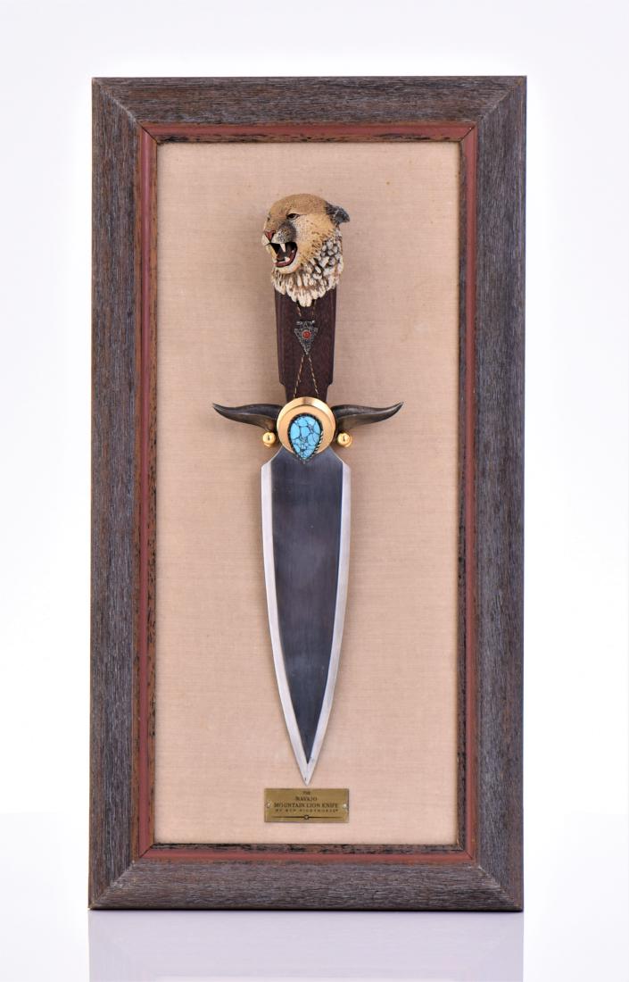 The Navajo Mountain Lion Knife By Ben Nighthorse.: The Navajo Mountain Lion Knife By Ben Nighthorse. Solid Heavy Hunting Knife Mounted On A Plaque. Estimated less than 50 yrs old. The Navajos are a Native American people of the Southwestern United Sta