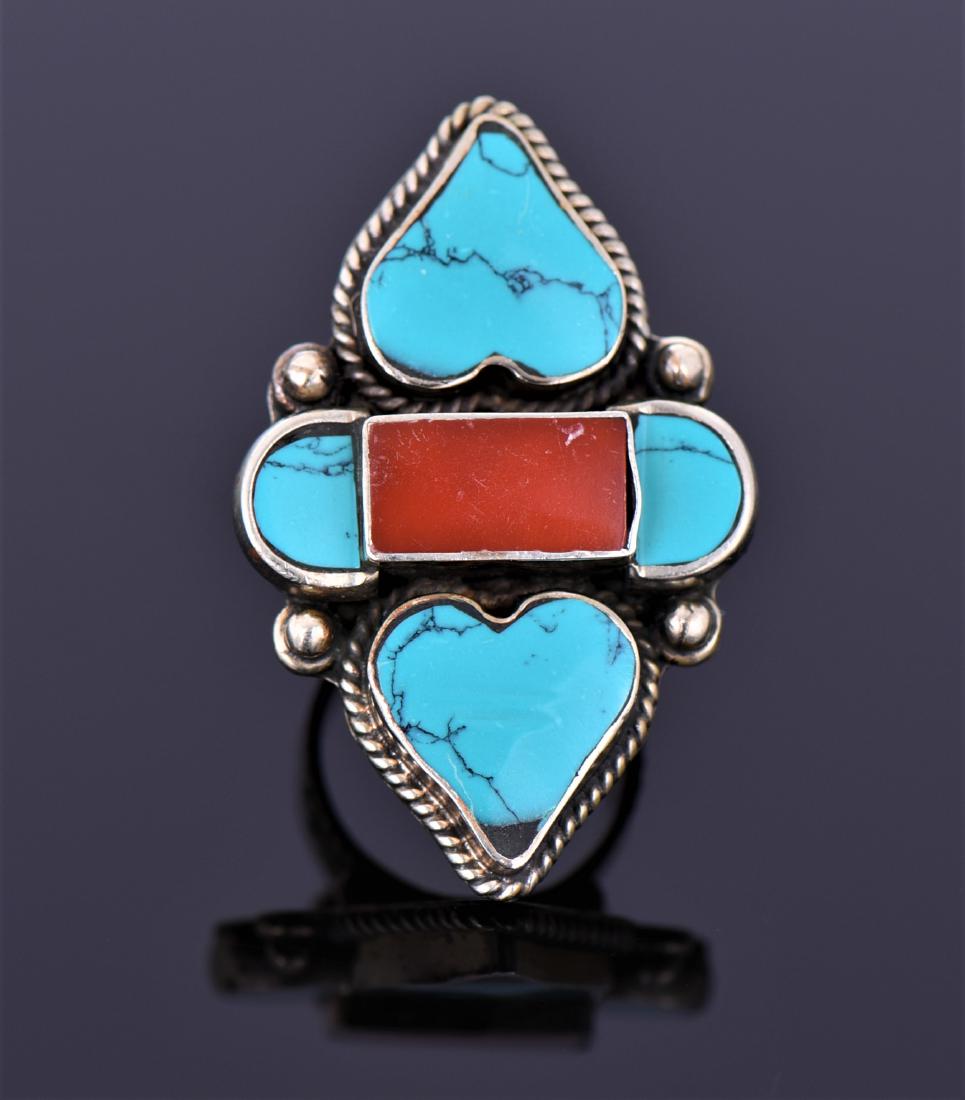 Tibetan Silver Turquoise And Carnelian Ring.: Tibetan Silver Turquoise And Carnelian Ring. Ring Size Adjustable 8.5 And Higher. Estimated more than 50 yrs old. Tibetan silver is used primarily in jewelry components, and is similar to pewter - an 