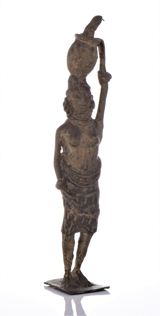 Antique Brass South African Sculptures of Woman: Antique Brass South African Sculptures of Woman Transporting A Water Jug On Her Head. Estimated more than 100 yrs old. African art is a term typically used for the art of Sub-Saharan Africa. A few of 