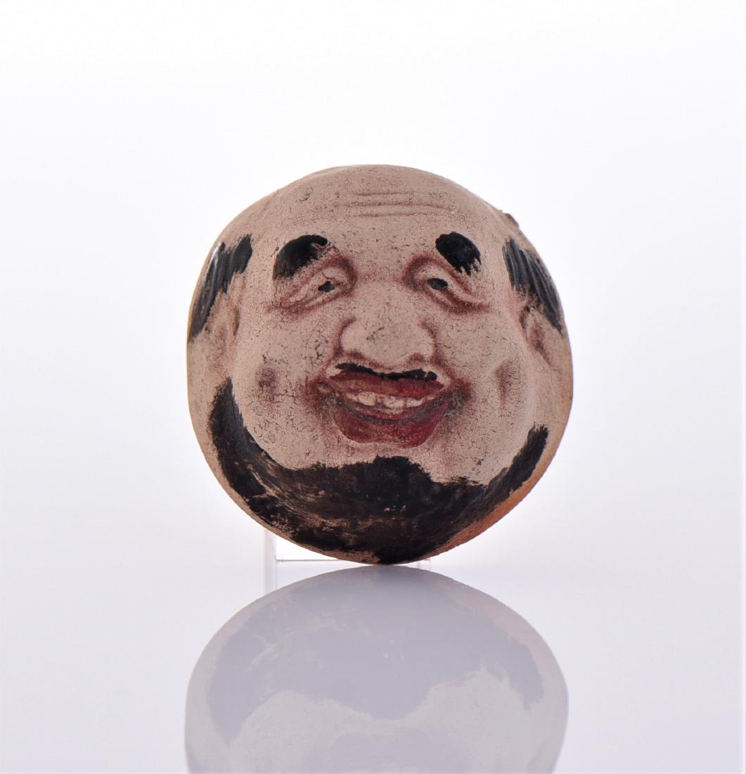 Chinese Hand Painted Miniature Clay Face: Chinese Hand Painted Miniature Clay Face. Estimated more than 75 yrs old. Chinese art is visual art that, whether ancient or modern. Early "stone age art" dates back to 10,000 BC, mostly consisting of