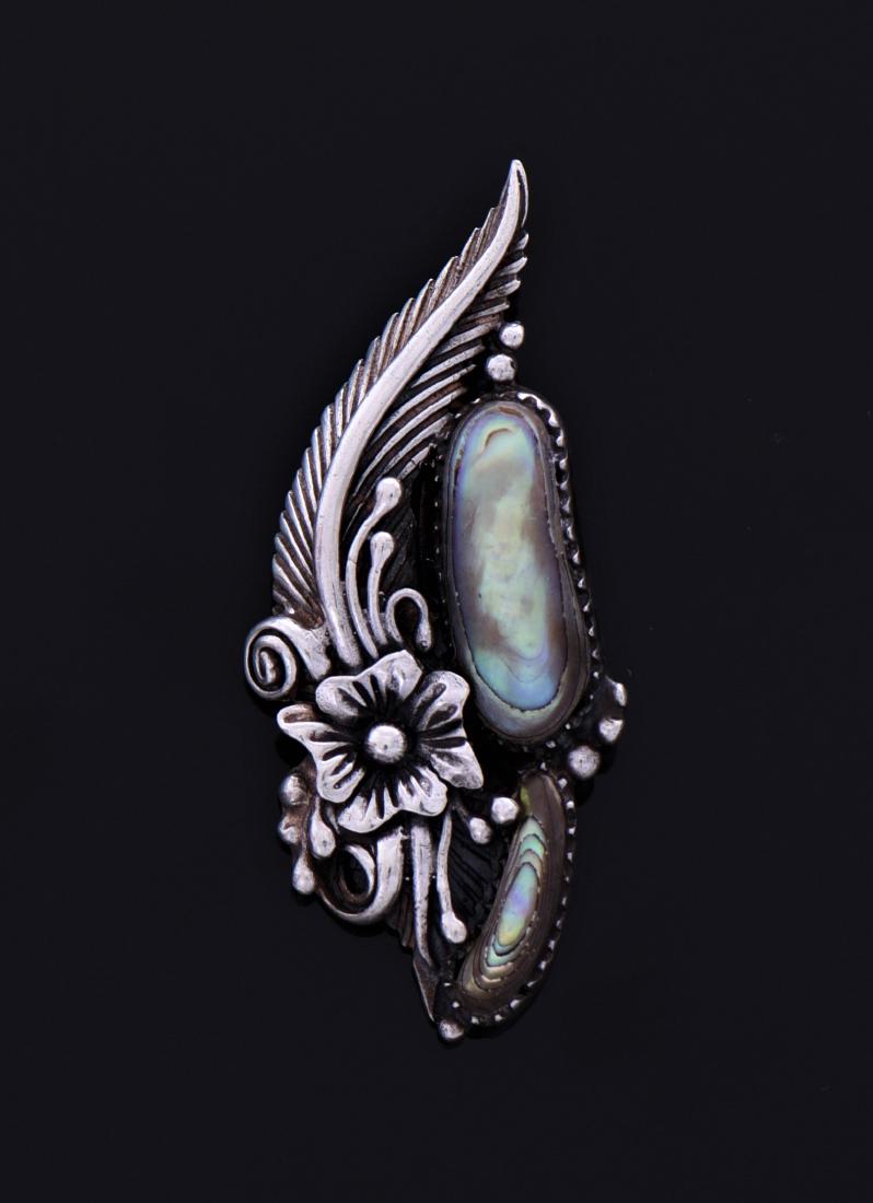 Native American Abalone Sterling Silver: Native American Abalone Sterling Silver Feather Flower Pendant. Silver Tested. Estimated more than 50 yrs old. Native Americans also known as American Indians or just simply Indians are considered to