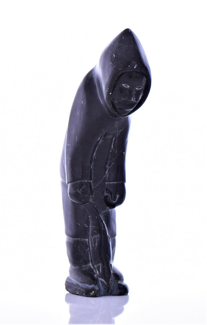 Inuit Soapstone Carving Of A Fisherman: Inuit Soapstone Carving of A Fisherman Holding A Fish Pulled From The Ice. Estimated more than 50 yrs old. Northwest, First Nations, Inuit and Metis art refers to artwork produced by the people of the