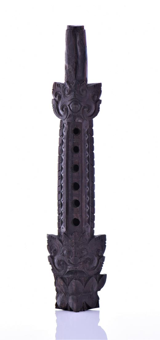 Wood Carved Flute: Wood Carved Flute. Condition Report: Small Chipped of Flower. Estimated more than 50 yrs old. Indonesian art consists of various artistic expressions and artworks of the archipelagic nation of Indones