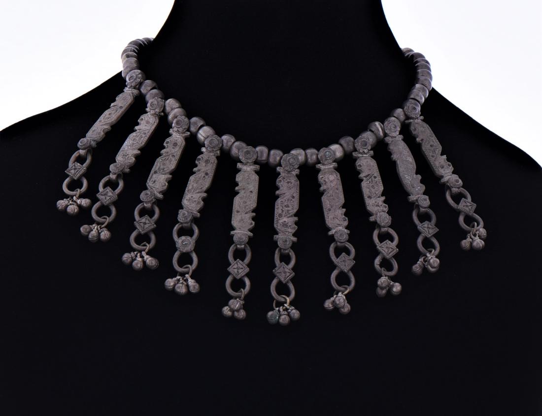 Antique Tharu Tribal Tibetan Silver: Antique Tharu Tribal Tibetan Silver Necklace. The Tharu people are an ethnic group indigenous to the southern foothills of the Himalayas. Most of the Tharu people live in the Nepal Terai. Estimated mo