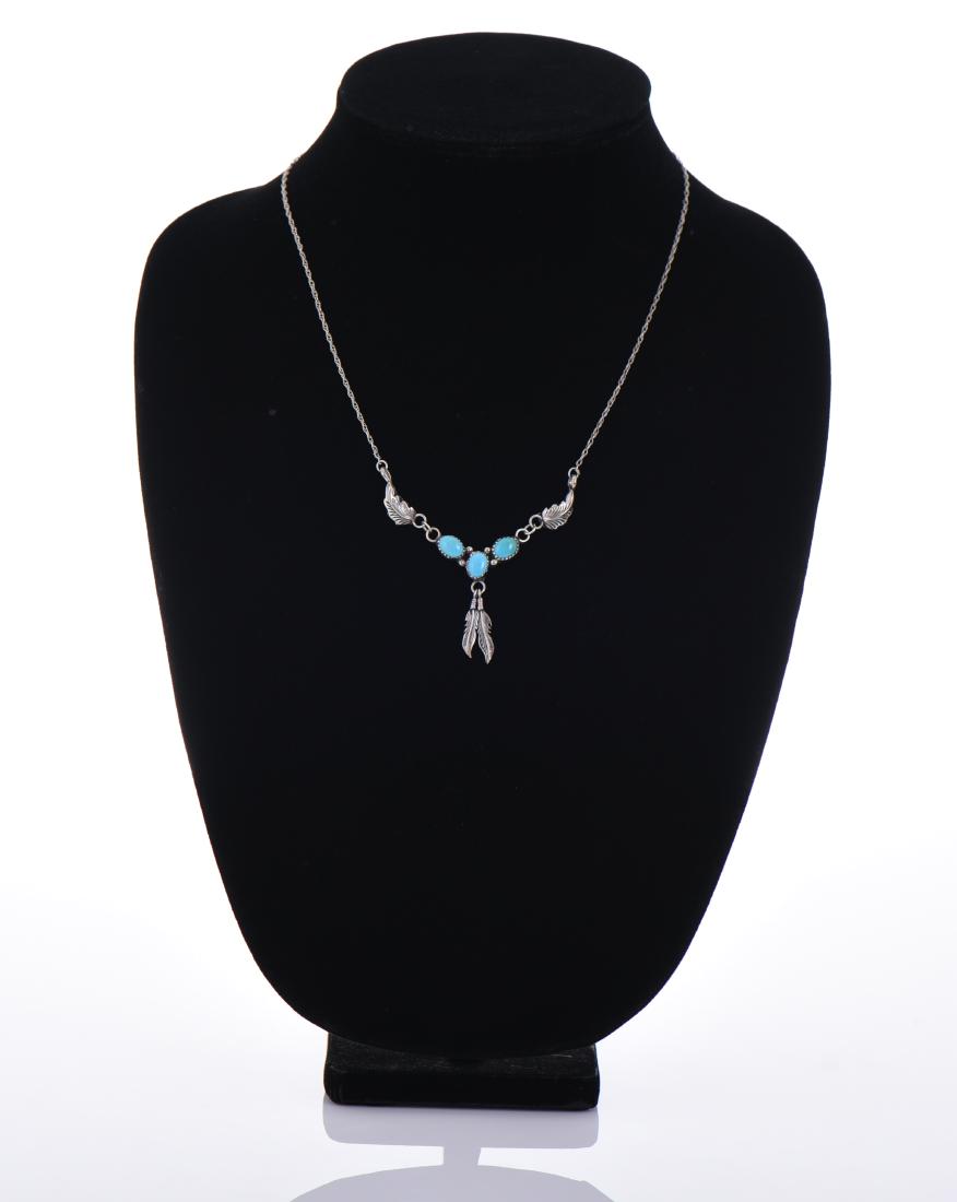 Benson Yazzie Navajo Sterling Silver Necklace: Benson Yazzie Navajo Sterling Silver Turquoise With Dangling Feathers Necklace Estimated more than 50 yrs old. The Navajos are a Native American people of the Southwestern United States. After the Che