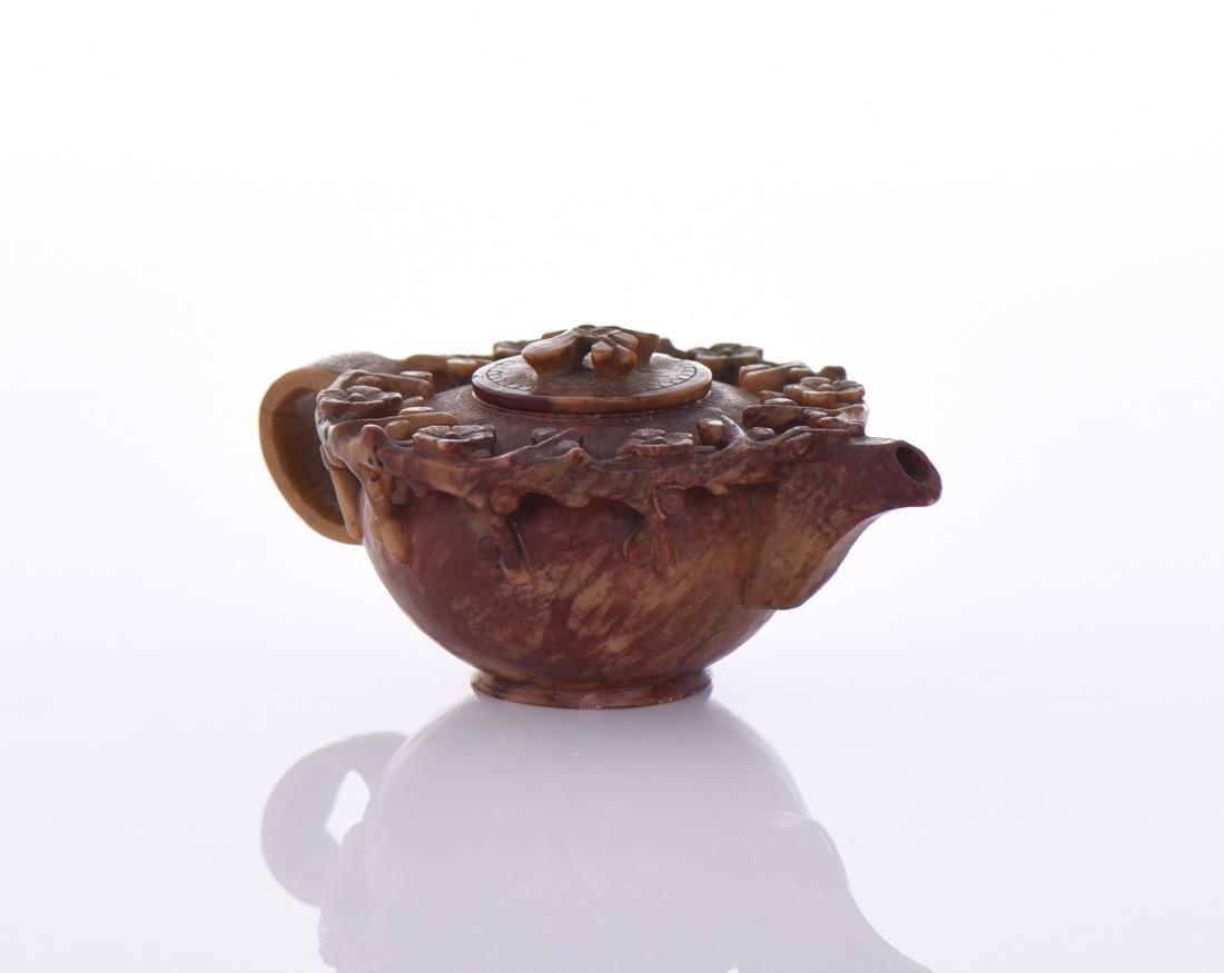 Carved Chicken Blood Stone Miniature Tea Pot: Carved Chicken Blood Stone Miniature Tea Pot. Estimated more than 100 yrs old. Chinese art is visual art that, whether ancient or modern. Early "stone age art" dates back to 10,000 BC, mostly consisti