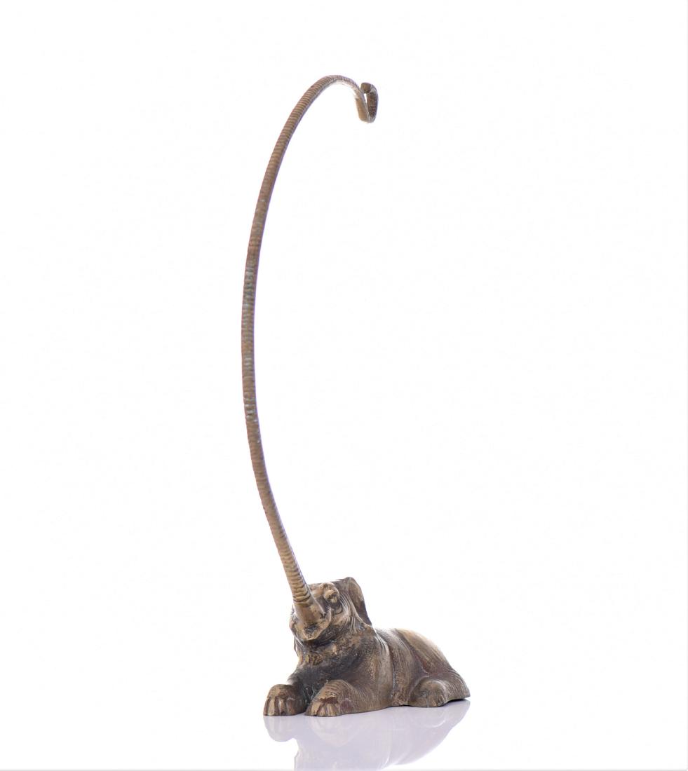Bronze Elephant Extended Trunk Hook Rack: Bronze Elephant Extended Trunk Hook Rack. Estimated more than 75 yrs old. Indian art consists of a variety of forms, including pottery, sculpture, paintings, and textiles. Geographically, it spans the