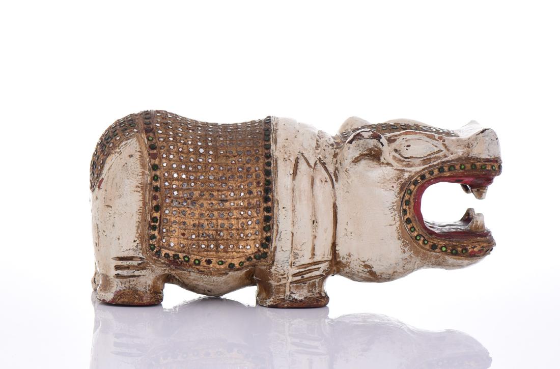 Wood Polychromed Hippo.: Wood Polychromed Hippo. Estimated more than 75 yrs old. Traditional Thai art is primarily composed of Buddhist art and scenes from the Indian epics. Traditional Thai sculpture almost exclusively depic