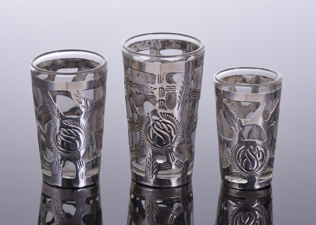 Mexican Shot Glasses With Silver Floral: Mexican Shot Glasses With Silver Floral Overlays And Eagle Hallmark Estimated more than 50 yrs old. 925 Sterling Silver consisting of 92.5% silver and 7.5% copper. Tested Positive using Nitric Acid Ch