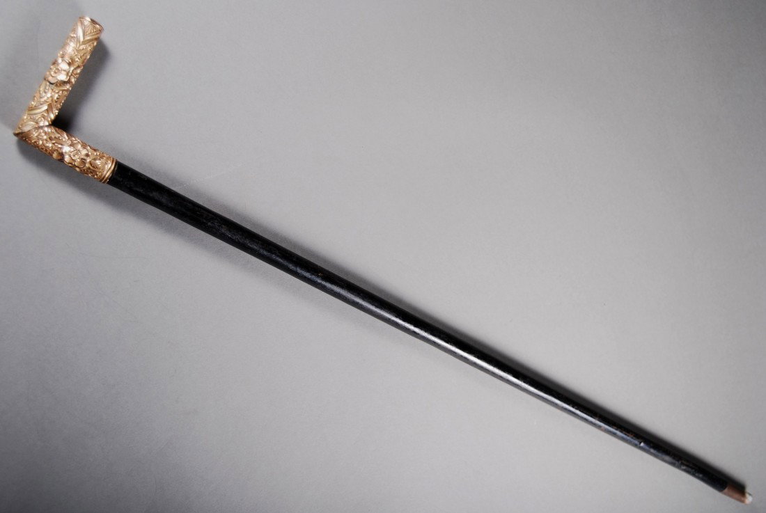 Victorian Cane Sword Repousse floral elements and g: Victorian Cane Sword Repousse floral elements and geometric designs in medium relief wrap on a 90 degree elbow handle. Cane separates to reveal a hidden 26” blade. Blade unsharpened and a crack, low