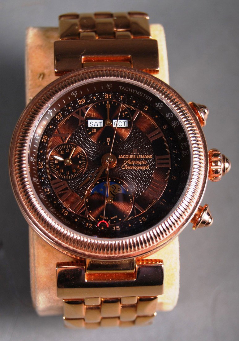 Jacques Lemans Men's Calendar Automatic Jewelry Wat: Jacques Lemans Men's Calendar Automatic Jewelry Watch Model 916I-8316. Gold plated band. Dial window material is Sapphire. 25 Jewel Valjoux 7751 Swiss Automatic Movement, Swiss made. Water resistant t