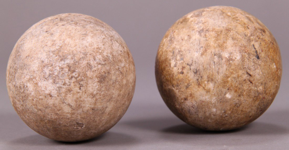 Native American Indian Game Balls (Pair) One of the: Native American Indian Game Balls (Pair) One of the best early examples of Northeast game balls (Cones). Carved stone. Ca. 900 to 1200 A.D. Height/Length= 3(in), Width=(in), Depth=(in).