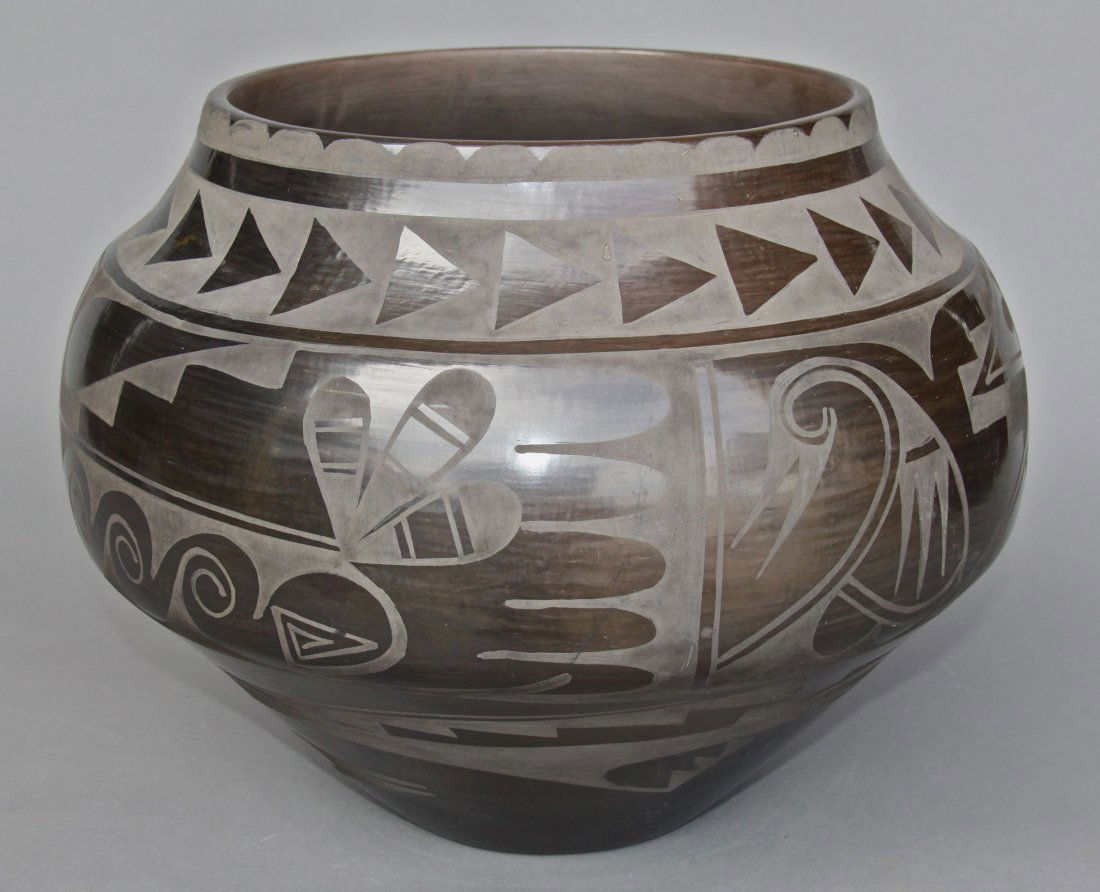 Carmelita Dunlap (1925-1999), San Ildefonso Pueblo Sout: Carmelita Dunlap (1925-1999), San Ildefonso Pueblo Southwest, Signed Black on Black Pottery [Height/Length (in)= 12, Width (in)=16.5, Depth (in)=N/A, Weight (lbs)=25] With C.O.A. signed by Chief Joe D