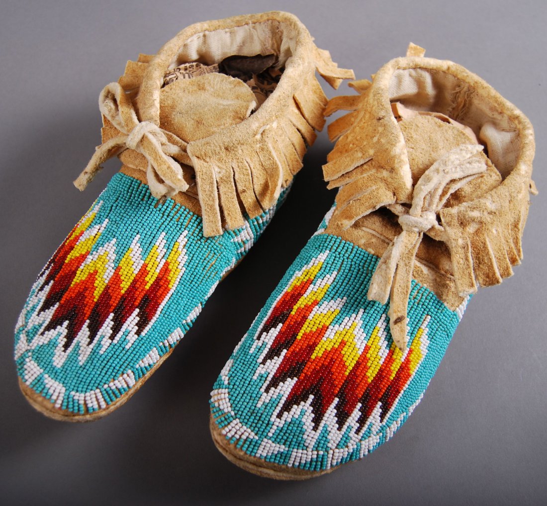Native American Indian Beaded Moccassins: Native American Indian Beaded Moccassins [Height/Length (in)= 10, Width (in)=4, Depth (in)=3.5, Weight (lbs)=1] With C.O.A. signed by Chief Joe Dan Osceola & Seminole Tribe.