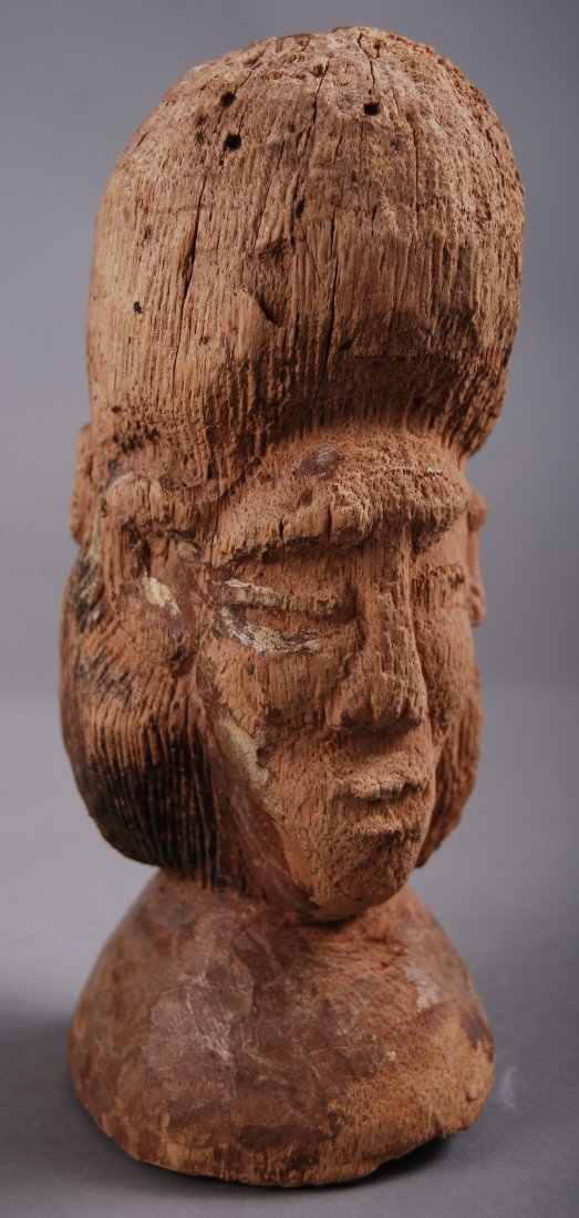 Wood Carving with two faces: Wood Carving with two faces. [Height/Length (in)= 7.5, Width (in)=4, Depth (in)=3, Weight (lbs)=1] With C.O.A. signed by Chief Joe Dan Osceola & Seminole Tribe.