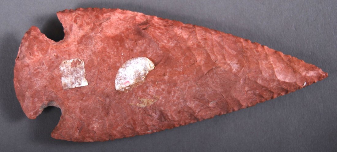 Native American Indian Artifact, Red Dovetail Arrowhea: Native American Indian Artifact, Red Dovetail Arrowhead [Height/Length (in)= 4.75, Width (in)=2, Depth (in)=0.5, Weight (lbs)=0.25] With C.O.A. signed by Chief Joe Dan Osceola & Seminole Tribe.