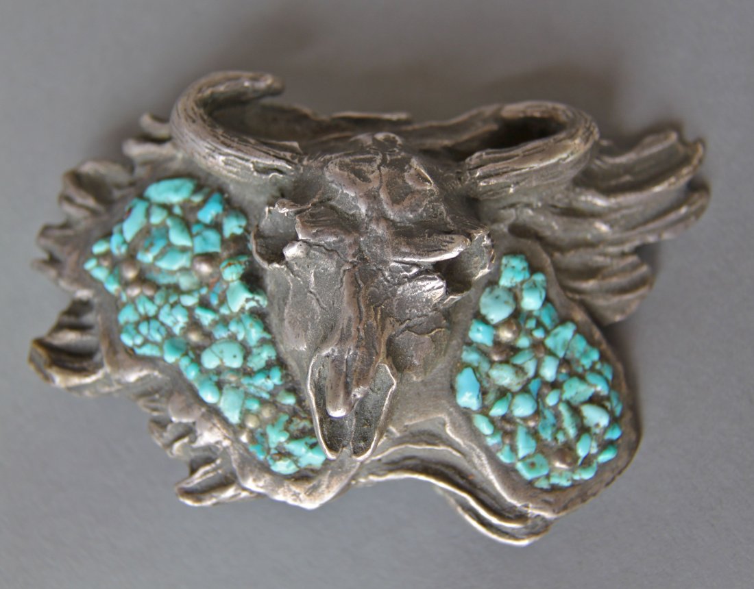 Turquoise Chips Bull Sterling Silver Belt Buckle: Turquoise Chips Bull Belt Buckle [Height/Length (in)= 4, Width (in)=2.5, Depth (in)=1.5, Weight (lbs)=0.5] With C.O.A. signed by Chief Joe Dan Osceola & Seminole Tribe.