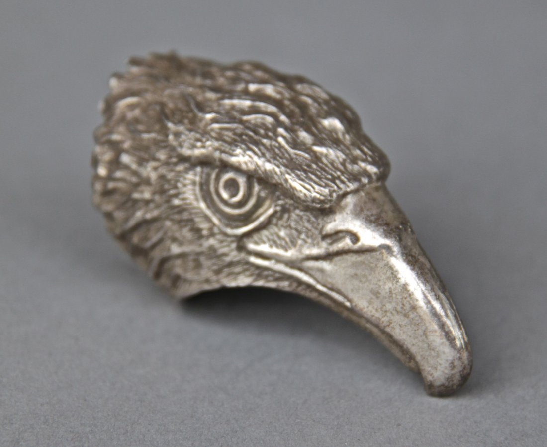 Eagle Head Sterling Silver Ring: Eagle Head Sterling Silver Ring [Height/Length (in)= 2.25, Width (in)=1.25, Depth (in)=1, Weight (lbs)=0.2] With C.O.A. signed by Chief Joe Dan Osceola & Seminole Tribe.