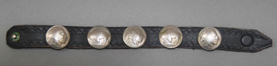 Single Silver Buffalo Nickel Concho Leather Bracelet: Single Silver Buffalo Nickel Concho Leather Bracelet [Height/Length (in)= 9, Width (in)=0.75, Depth (in)=0.25, Weight (oz)=1.35] With C.O.A. signed by Chief Joe Dan Osceola & Seminole Tribe.