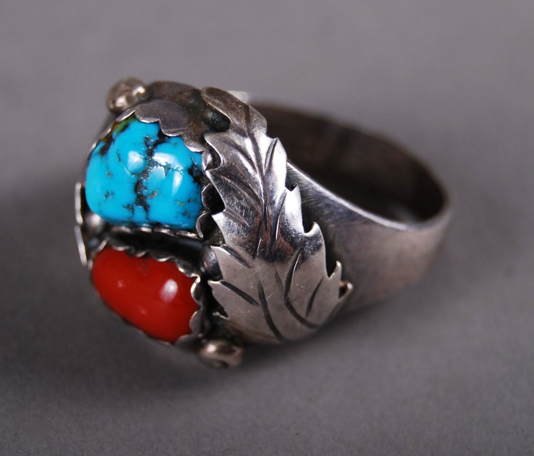 Turquoise Sterling Silver Ring with Red Stone: Turquoise Sterling Silver Ring with Red Stone [Height/Length (in)= 1.125, Width (in)=1, Depth (in)=0.75, Weight (oz)=0.45] With C.O.A. signed by Chief Joe Dan Osceola & Seminole Tribe.
