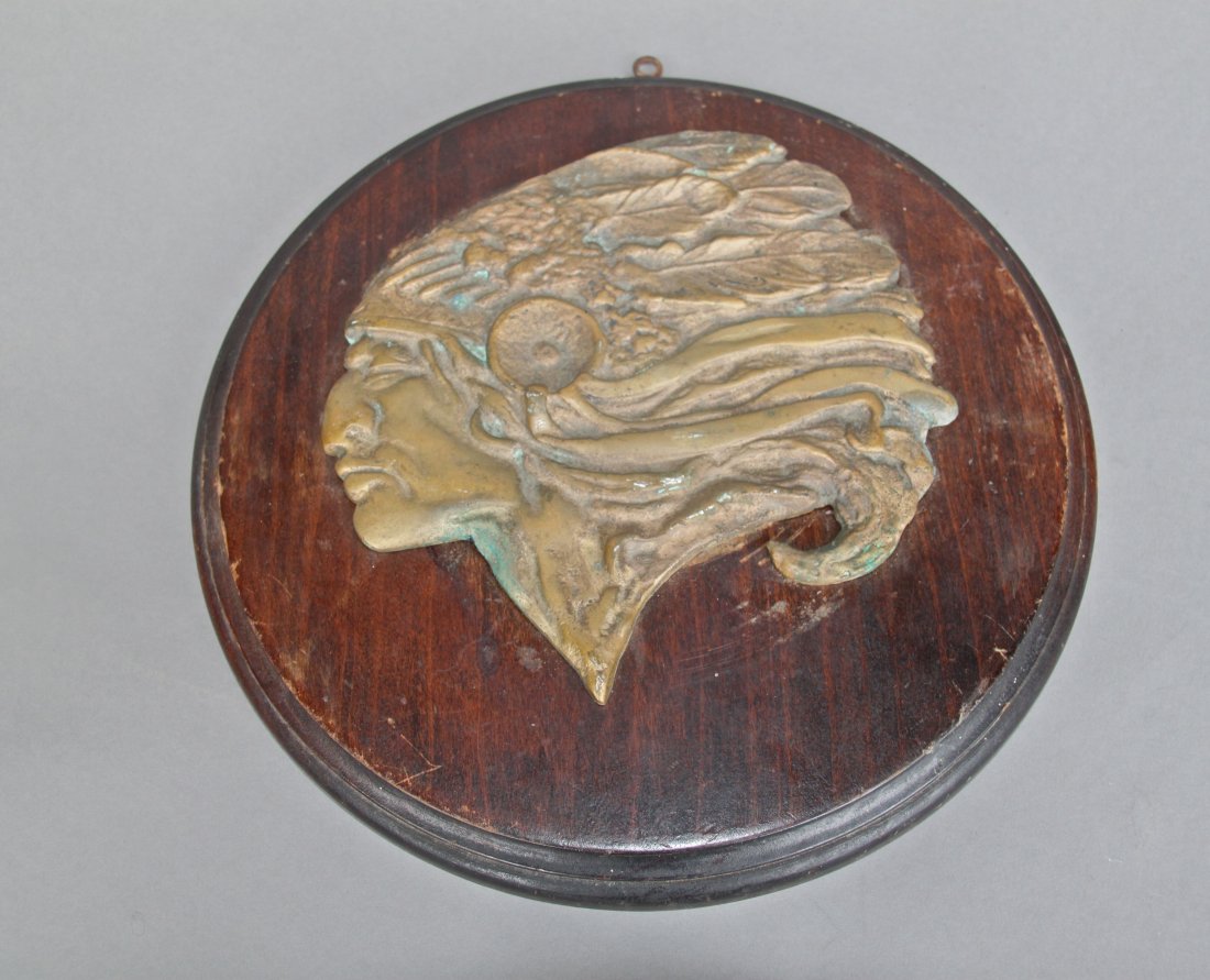 1928 Indian Head Plaque (Round shape) Bronze on Wood,: 1928 Indian Head Plaque (Round shape) Bronze on Wood, Signed [Height/Length (in)= 11.25, Width (in)=11.25, Depth (in)=1, Weight (lbs)=6] With C.O.A. signed by Chief Joe Dan Osceola & Seminole Tribe.
