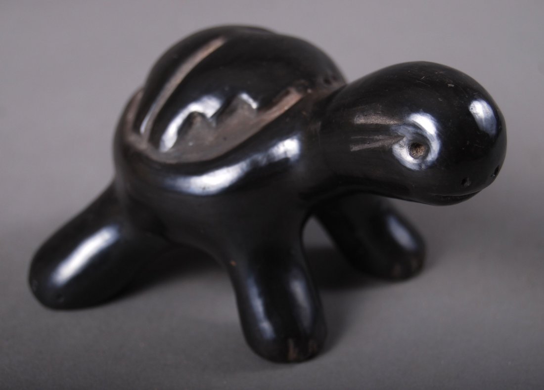 Native American Indian Turtle with Black Pottery. Sign: Native American Indian Turtle with Black Pottery. Signed: "Jane & Stare Clara Santa Pueble" [Height/Length (in)= 2.5, Width (in)=4, Depth (in)=3, Weight (lbs)=0.5] With C.O.A. signed by Chief Joe Dan 