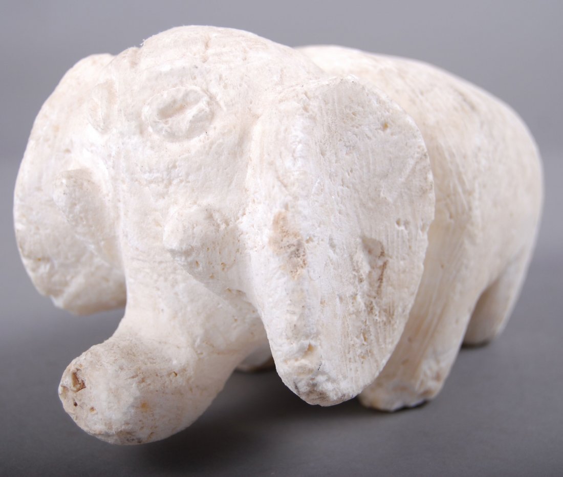 Amerian Indian Carved Coral Elephant: Amerian Indian Carved Coral Elephant [Height/Length (in)= 4, Width (in)=7, Depth (in)=4, Weight (lbs)=3] With C.O.A. signed by Chief Joe Dan Osceola & Seminole Tribe.