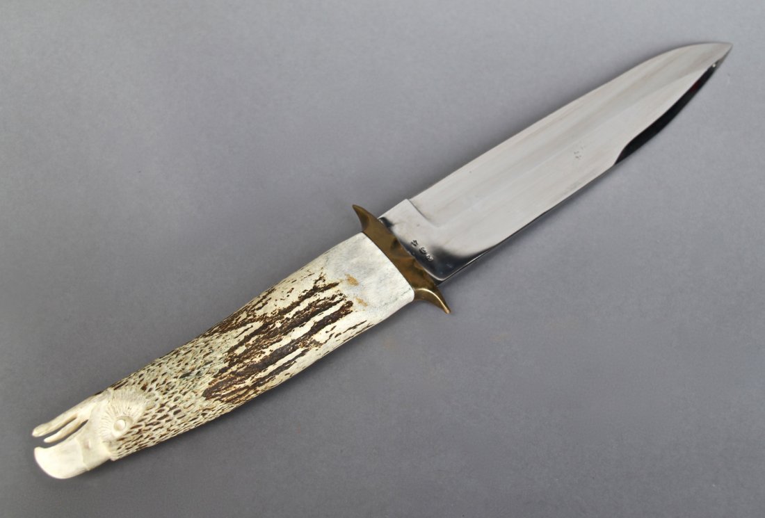 Hand Made Knife, Antler Carved Soaring Eagle Handle: Hand Made Knife, Antler Carved Soaring Eagle Handle [Height/Length (in)= 19.5, Width (in)=3, Depth (in)=1.5, Weight (lbs)=2] With C.O.A. signed by Chief Joe Dan Osceola & Seminole Tribe.
